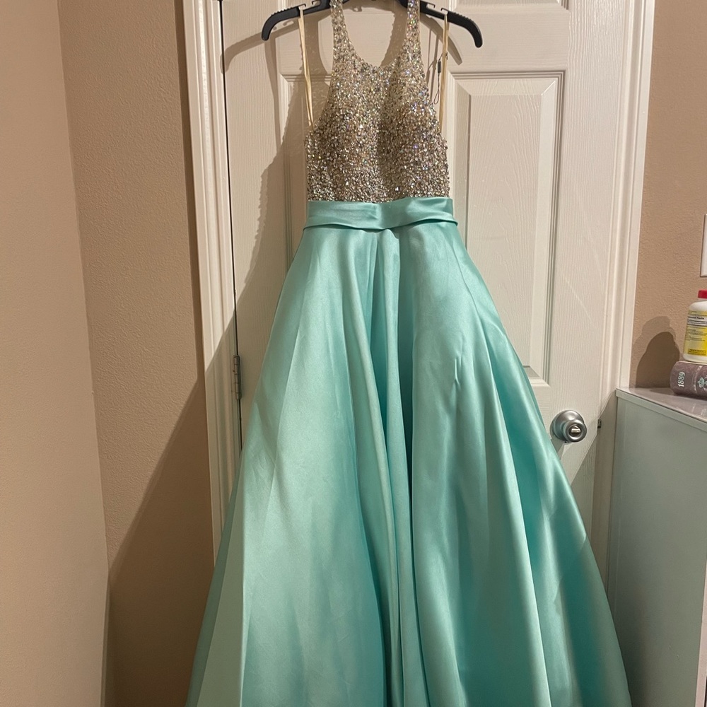 Franssical dress,turquoise maxi/prom dress,size 2, backless, and it had pockets.